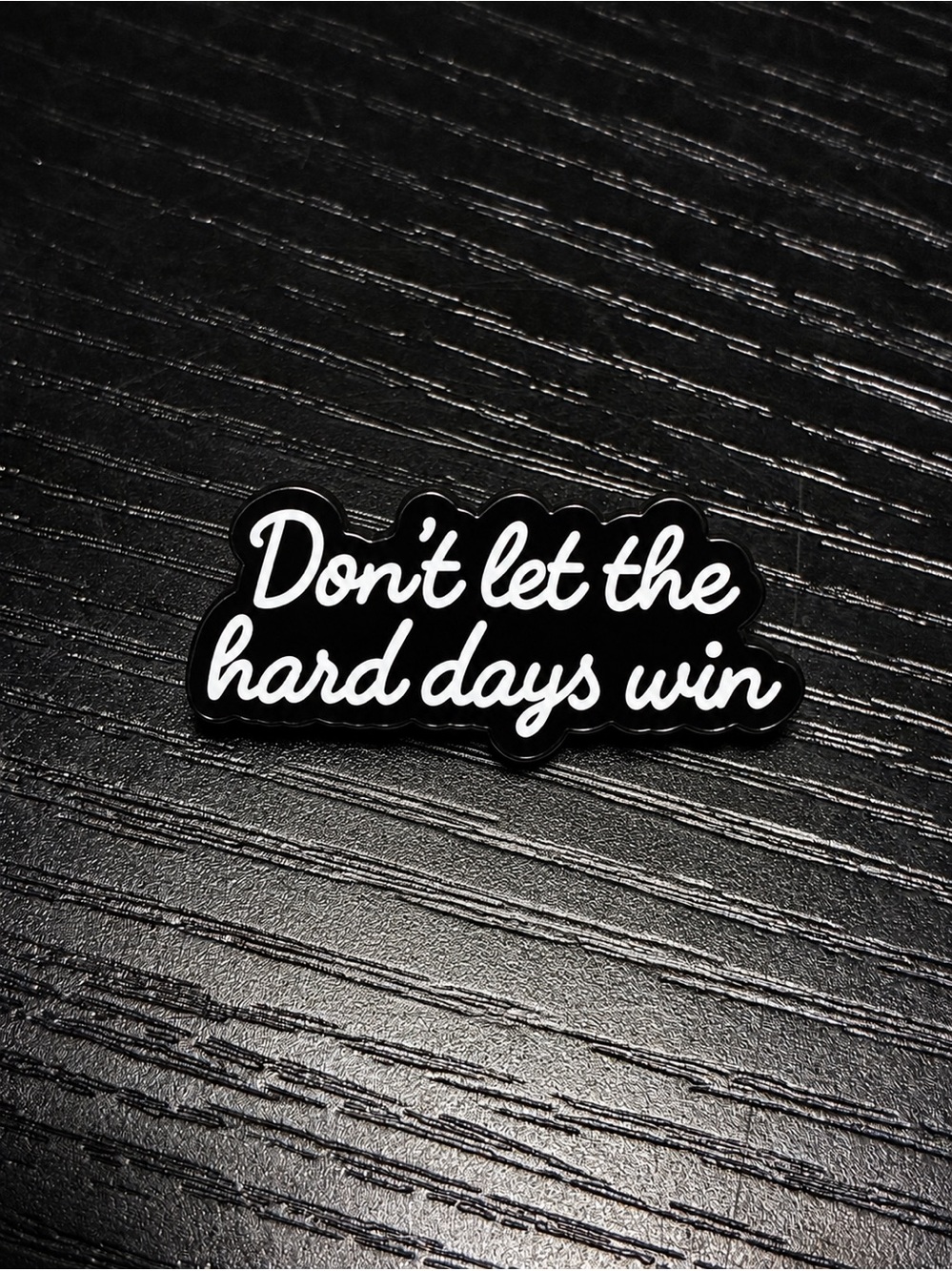 Don’t Let the Hard Days Win Black and White Motivational Pin